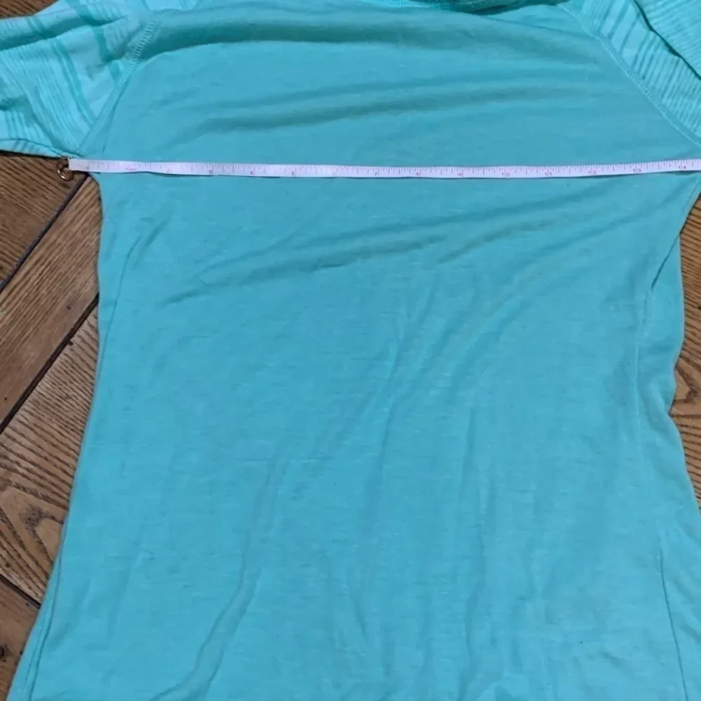 Girls small teal hooded shirt with black small stretchy shorts in box 11